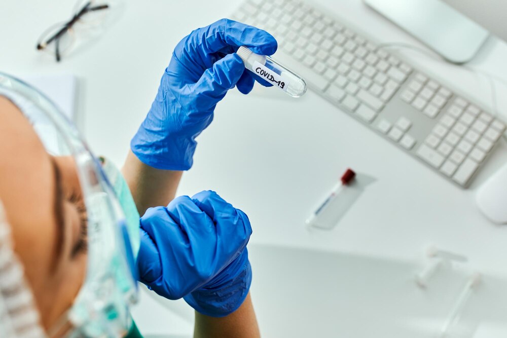 Closeup of healthcare expert analyzing coronavirus sample while working in a laboratory